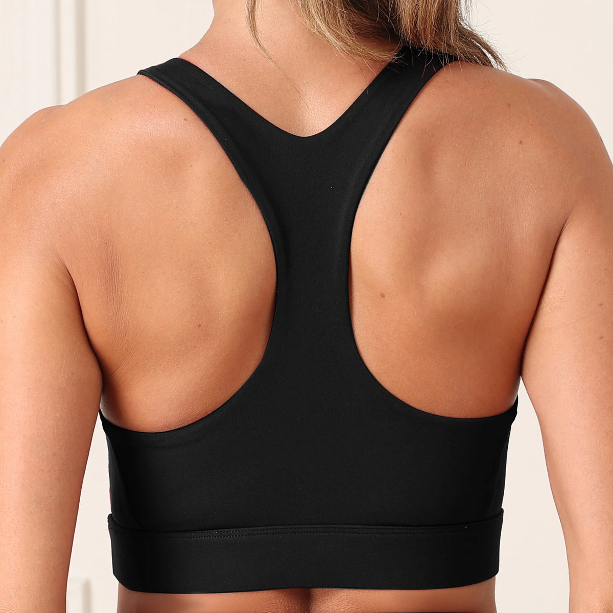 Top Sportivo Donna con Imbottiture Rimovibili e Design Posteriore a T